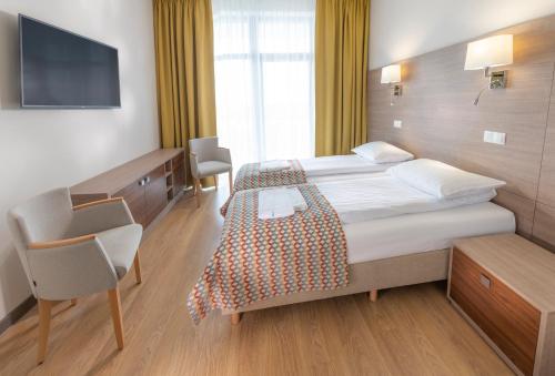 Imagen de la habitación del Hotel Olymp IV. Foto 15