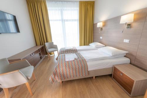 Imagen de la habitación del Hotel Olymp IV. Foto 18