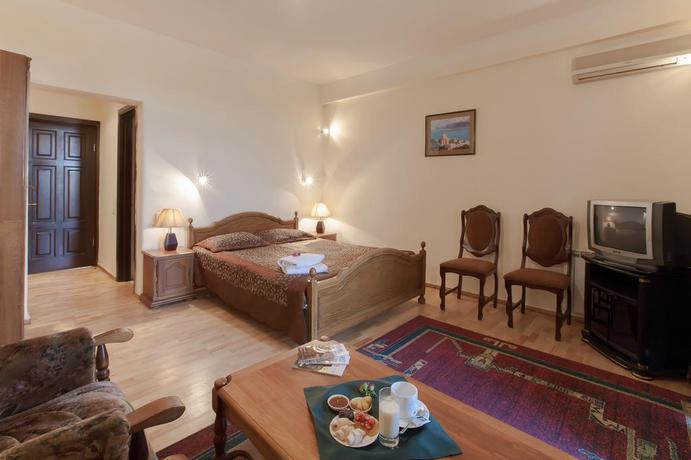 Imagen de la habitación del Hotel Olympia Garden. Foto 10