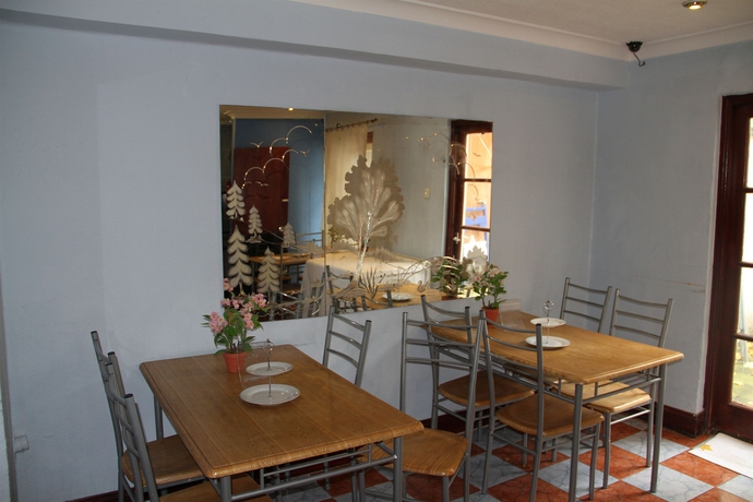 Imagen del bar/restaurante del Hotel Olympia, Londres. Foto 5