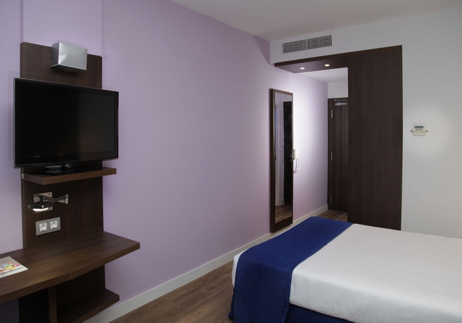 Imagen de la habitación del Hotel Olympia Universidades. Foto 11