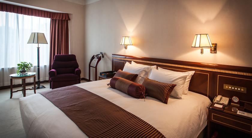 Imagen de la habitación del Hotel Olympic Club Hotel, Xujiahui. Foto 4