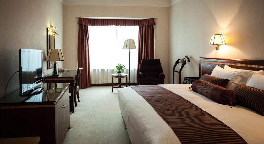 Imagen de la habitación del Hotel Olympic Club Hotel, Xujiahui. Foto 5