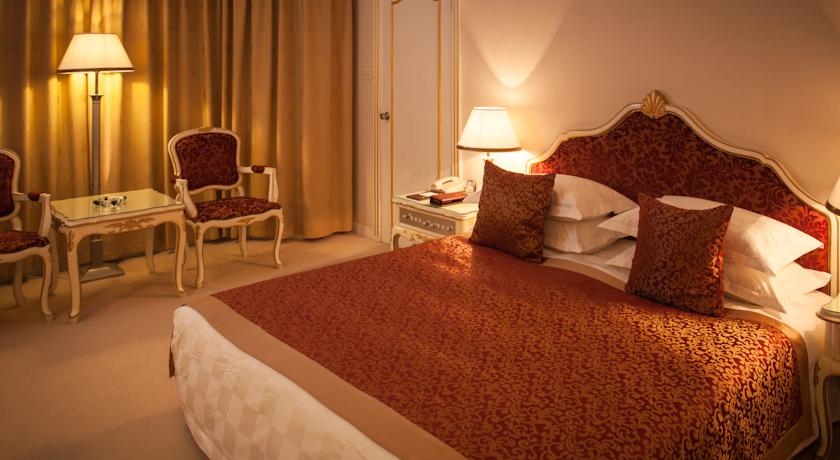 Imagen de la habitación del Hotel Olympic Club Hotel, Xujiahui. Foto 7