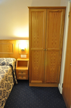 Imagen de la habitación del Hotel Olympic House. Foto 9