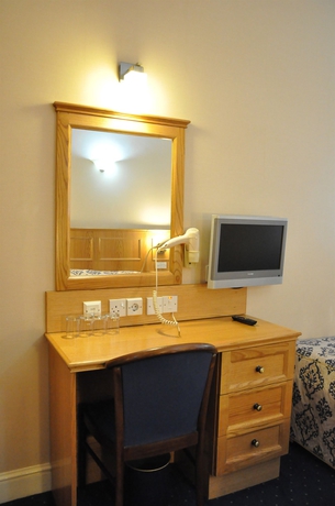 Imagen de la habitación del Hotel Olympic House. Foto 10