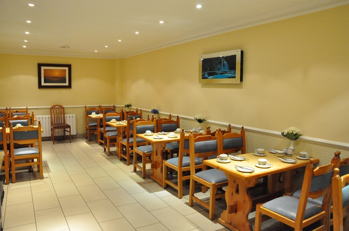 Imagen del bar/restaurante del Hotel Olympic House. Foto 5