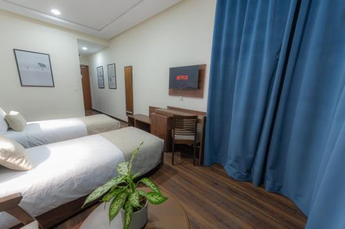 Imagen de la habitación del Hotel Olympic Inn Casablanca. Foto 20