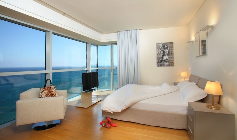 Imagen de la habitación del Hotel Olympic Residence. Foto 16