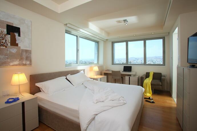 Imagen de la habitación del Hotel Olympic Residence. Foto 19