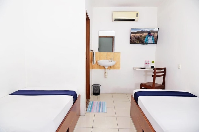 Imagen de la habitación del Hotel Olympic, Sekayu. Foto 6