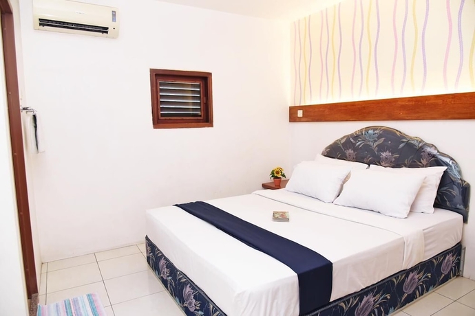 Imagen de la habitación del Hotel Olympic, Sekayu. Foto 7