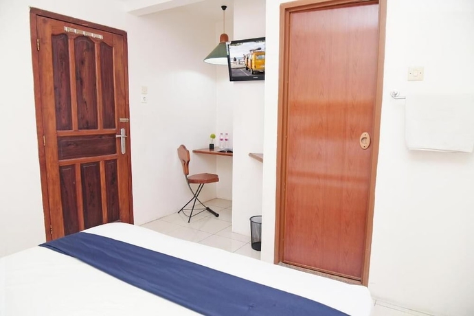 Imagen de la habitación del Hotel Olympic, Sekayu. Foto 8