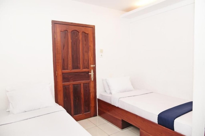 Imagen de la habitación del Hotel Olympic, Sekayu. Foto 10