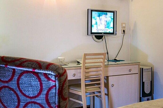 Imagen de la habitación del Hotel Olympic Star. Foto 26