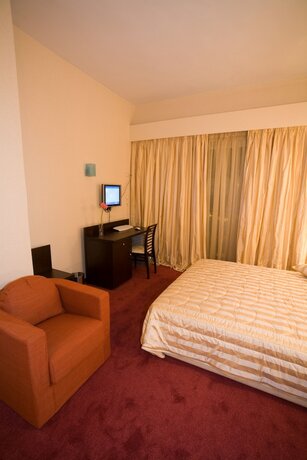 Imagen de la habitación del Hotel Olympic Star. Foto 27