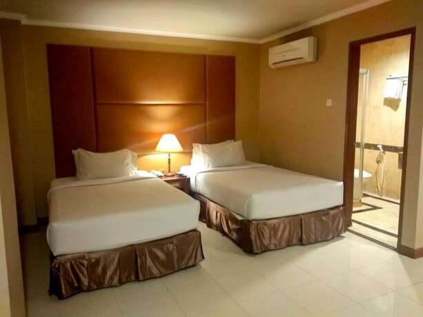 Imagen de la habitación del Hotel Olympic, Tangki. Foto 14