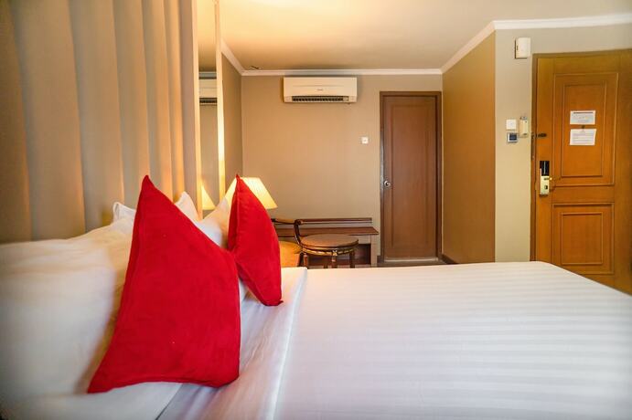 Imagen de la habitación del Hotel Olympic, Tangki. Foto 15