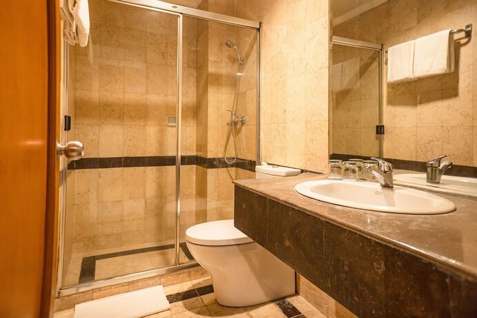 Imagen de la habitación del Hotel Olympic, Tangki. Foto 20