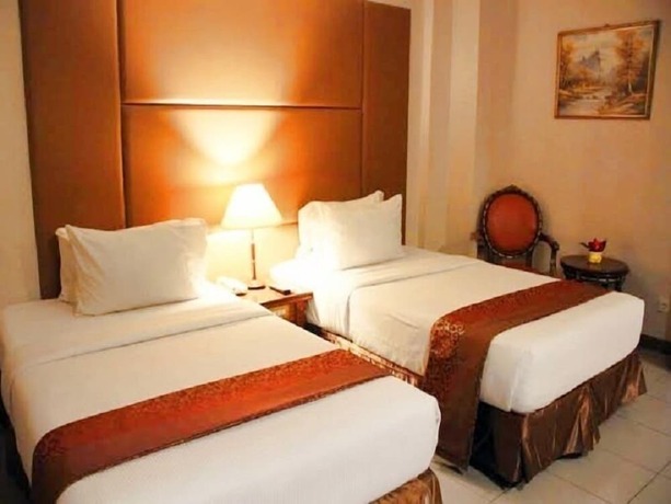 Imagen de la habitación del Hotel Olympic, Tangki. Foto 26