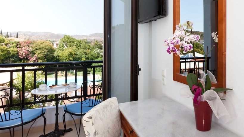 Imagen de la habitación del Hotel Olympic Village and Spa. Foto 12