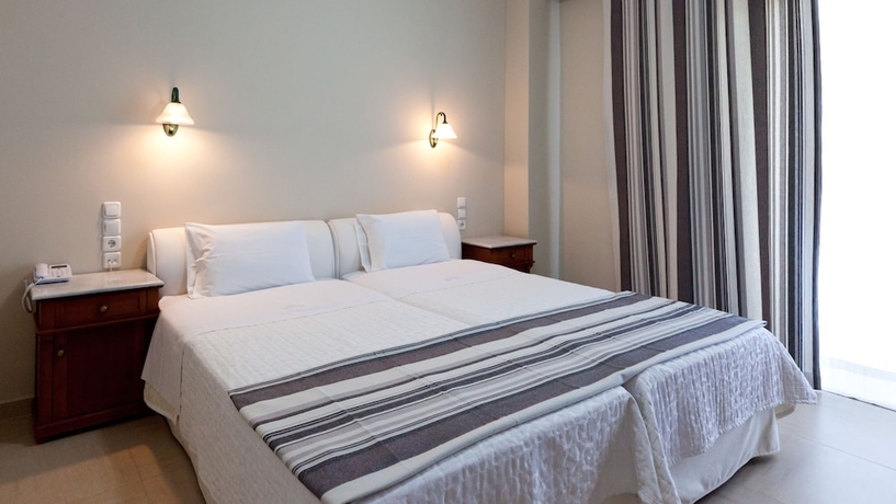 Imagen de la habitación del Hotel Olympic Village and Spa. Foto 16