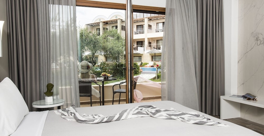 Imagen de la habitación del Hotel Olympion Sunset. Foto 2