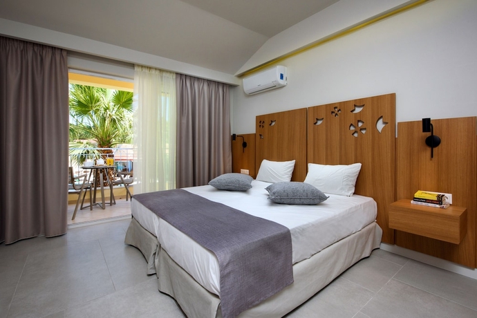 Imagen de la habitación del Hotel Olympion Village. Foto 15