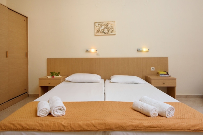 Imagen de la habitación del Hotel Olympion Village. Foto 19