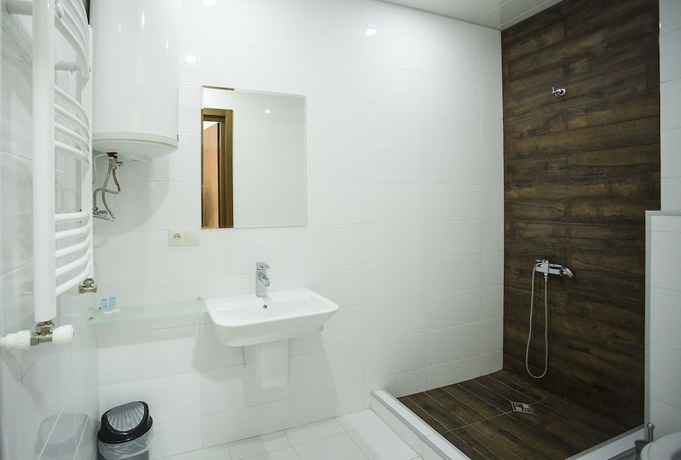 Imagen de la habitación del Hotel Olympus By Umbrella. Foto 4