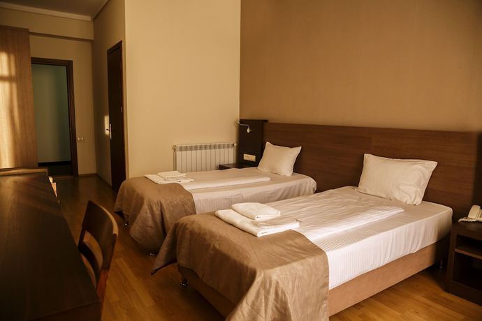 Imagen de la habitación del Hotel Olympus By Umbrella. Foto 6