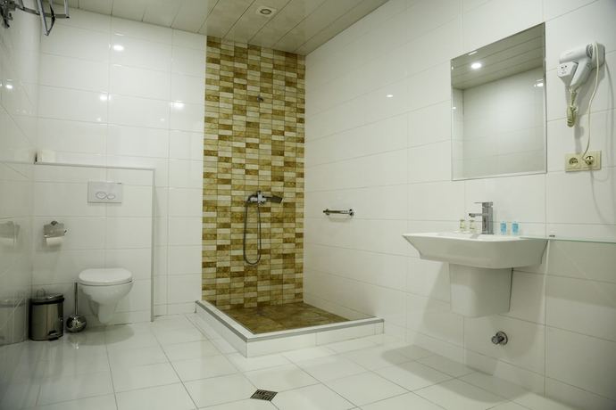 Imagen de la habitación del Hotel Olympus By Umbrella. Foto 7