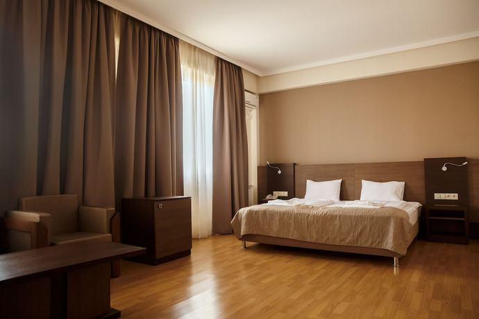 Imagen de la habitación del Hotel Olympus By Umbrella. Foto 14