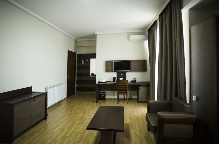 Imagen de la habitación del Hotel Olympus By Umbrella. Foto 15