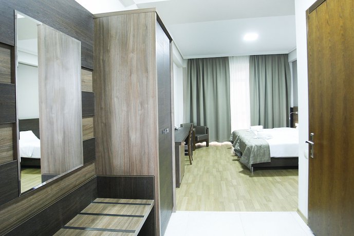 Imagen de la habitación del Hotel Olympus By Umbrella. Foto 18