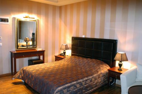 Imagen de la habitación del Hotel Olympus Mediterranean. Foto 5