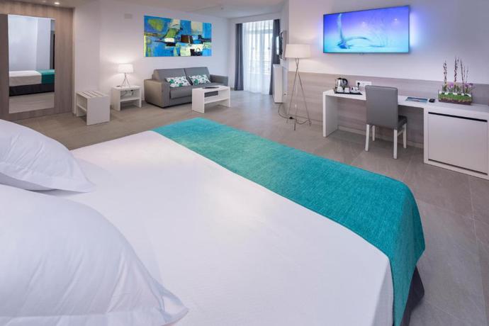 Imagen de la habitación del Hotel Olympus Palace. Foto 7