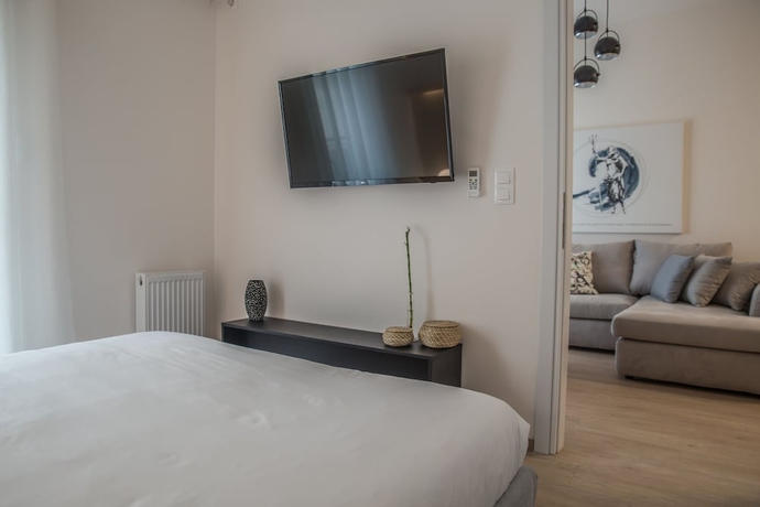 Imagen de la habitación del Hotel Olympus Residence. Foto 8