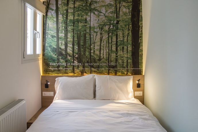 Imagen de la habitación del Hotel Olympus Residence. Foto 13