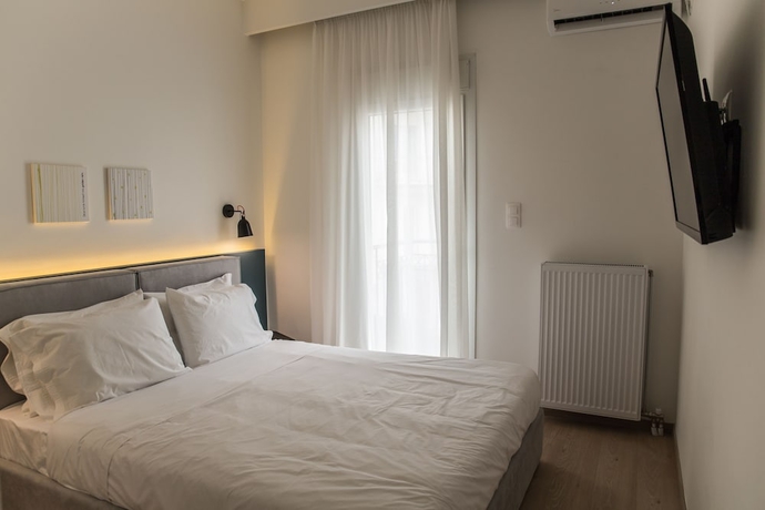 Imagen de la habitación del Hotel Olympus Residence. Foto 15