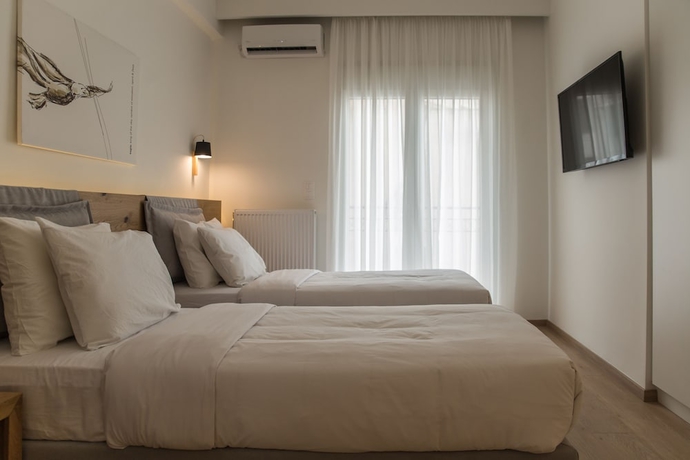 Imagen de la habitación del Hotel Olympus Residence. Foto 16