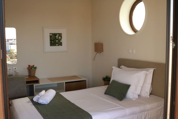 Imagen de la habitación del Hotel Olympus Terra Boutique. Foto 2