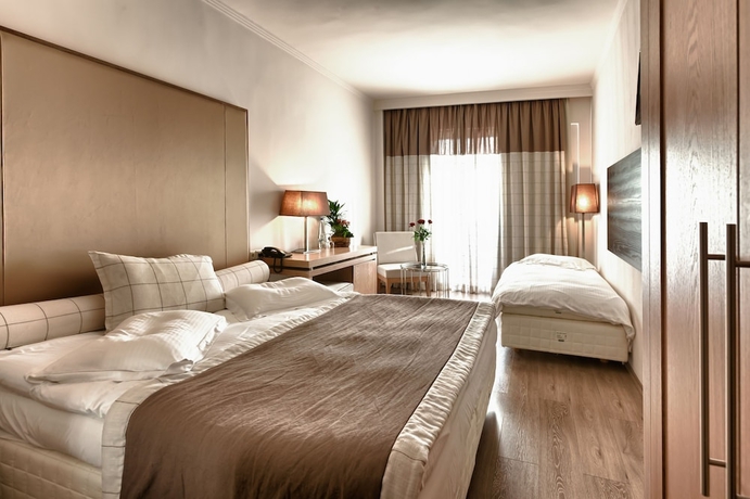 Imagen de la habitación del Hotel Olympus Thea Boutique. Foto 3