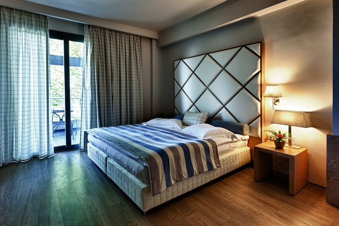 Imagen de la habitación del Hotel Olympus Thea Boutique. Foto 4