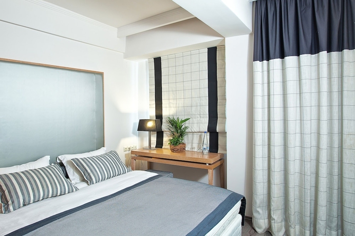 Imagen de la habitación del Hotel Olympus Thea Boutique. Foto 6