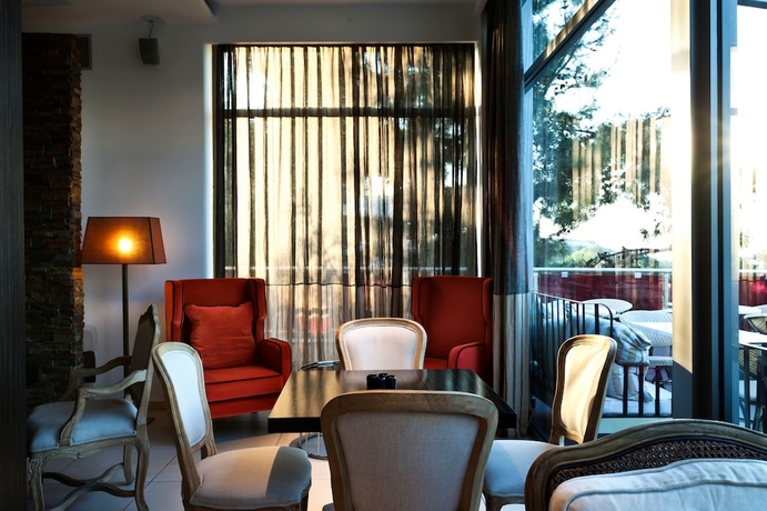 Imagen del bar/restaurante del Hotel Olympus Thea Boutique. Foto 2