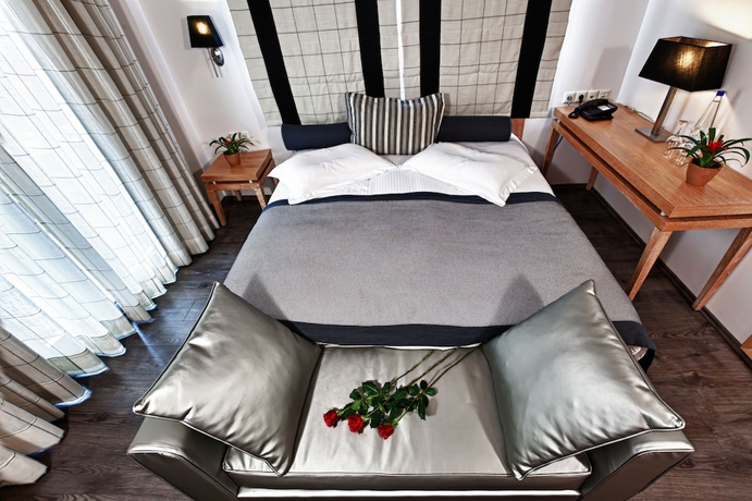 Imagen de la habitación del Hotel Olympus Thea Boutique. Foto 11