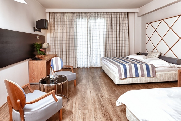 Imagen de la habitación del Hotel Olympus Thea Boutique. Foto 12