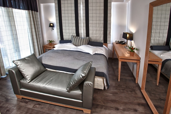 Imagen de la habitación del Hotel Olympus Thea Boutique. Foto 13
