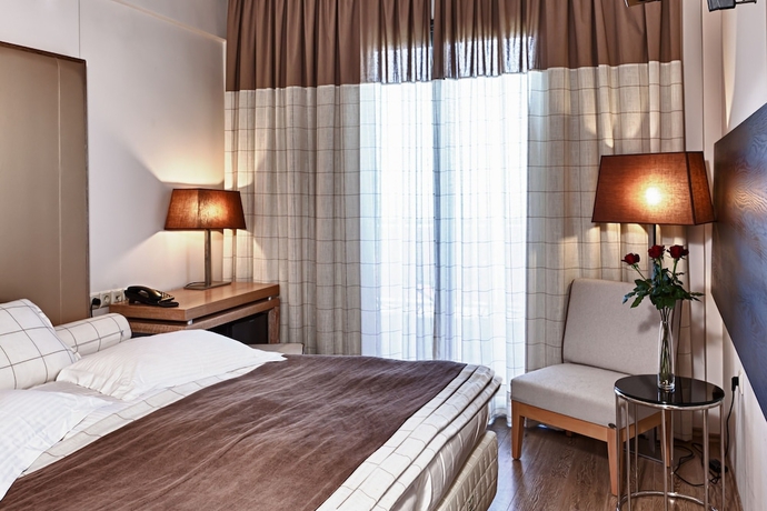 Imagen de la habitación del Hotel Olympus Thea Boutique. Foto 15